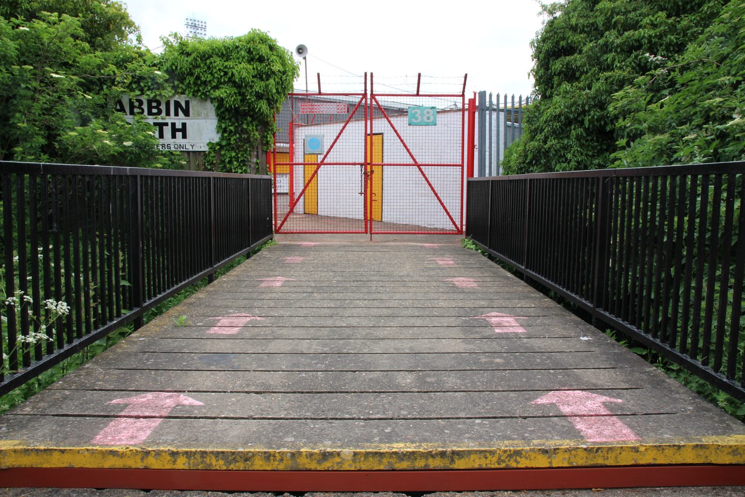Abbey Stadium stand entrance with social distancing arrows