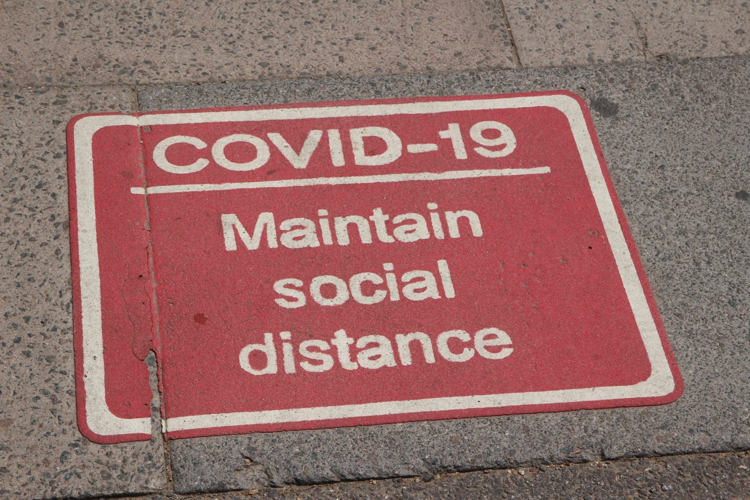 Social distancing sign on Mill Road Bridge approach