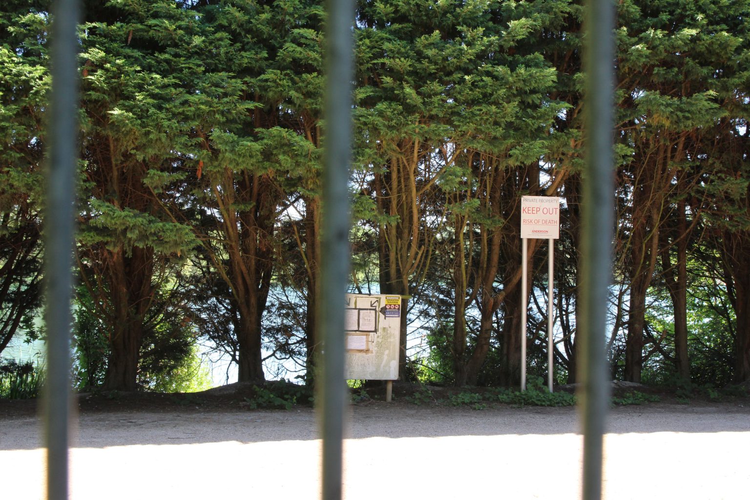 Glimpse of West Lake through site entrance
