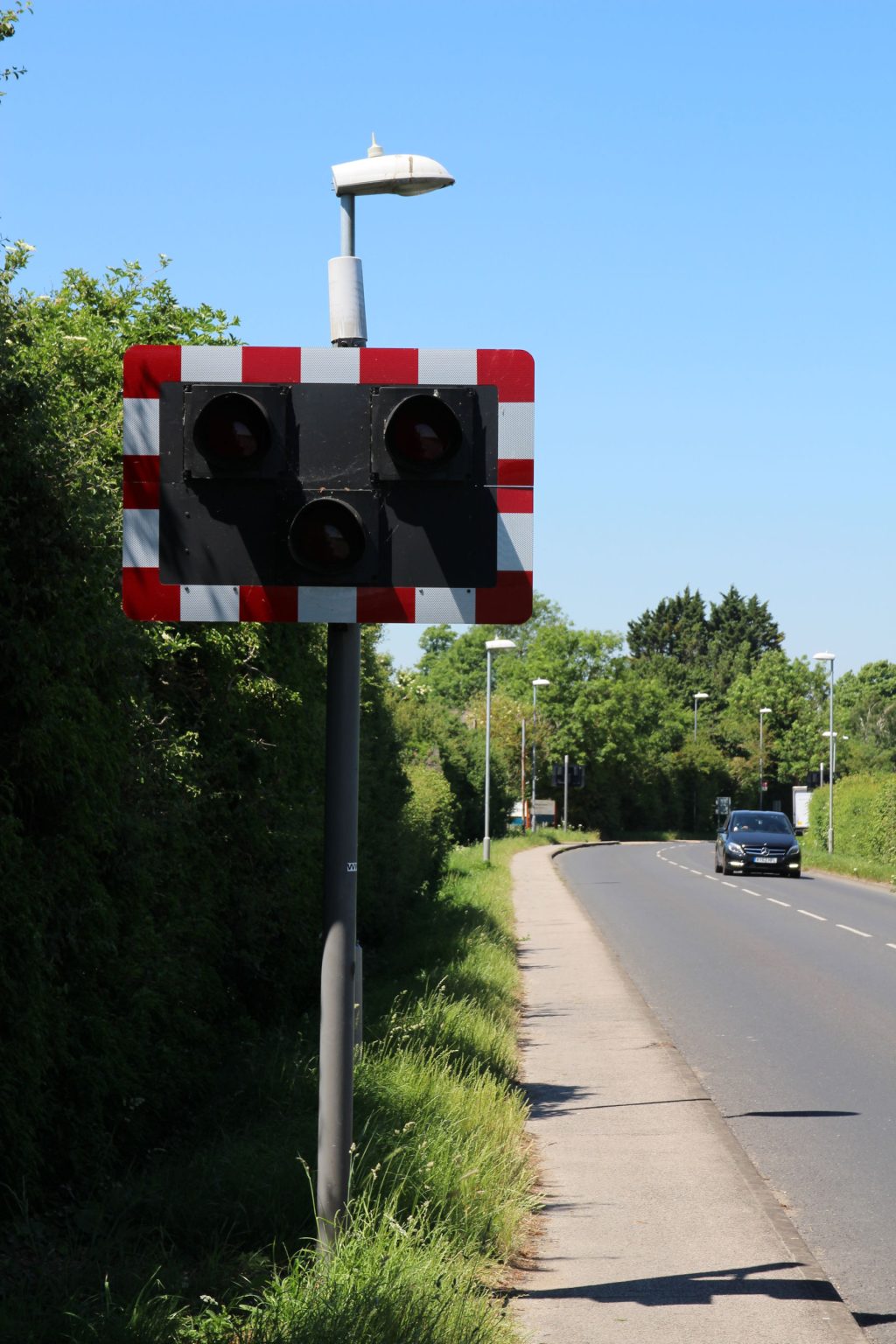 Runway crossing stop light on Coldham's Lane