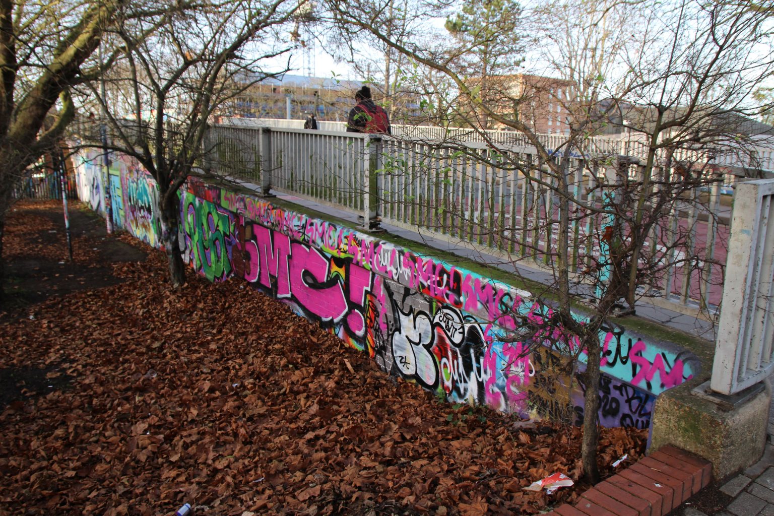 Graffiti on side of Mill Road Bridge