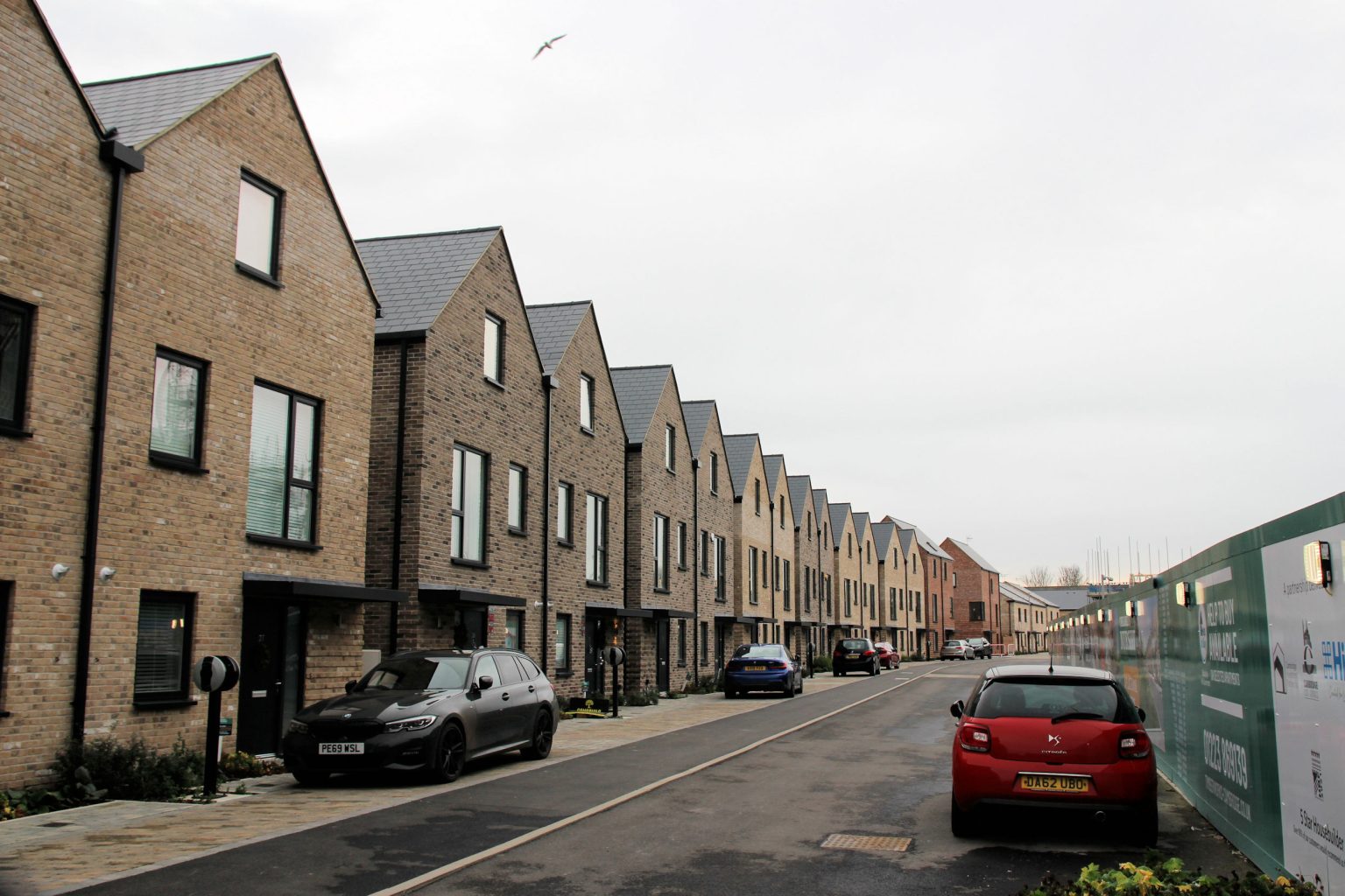 Houses on Cromwell Road side of Timber Works development