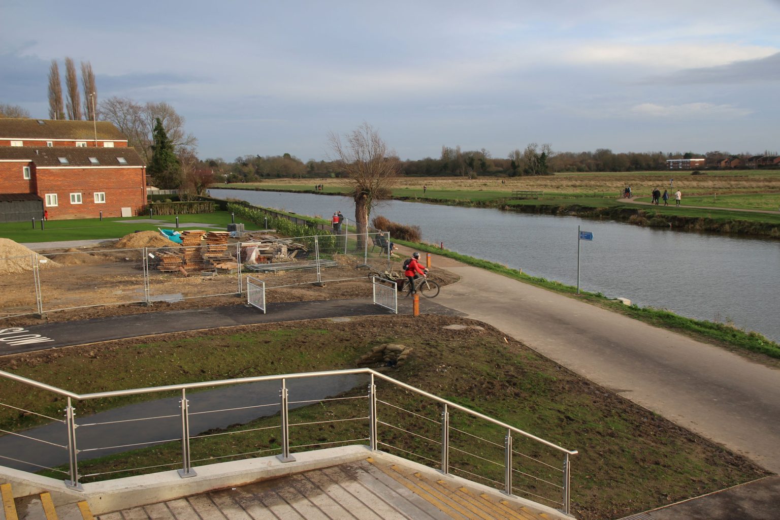 Steps down from footbridge and cycle path exit